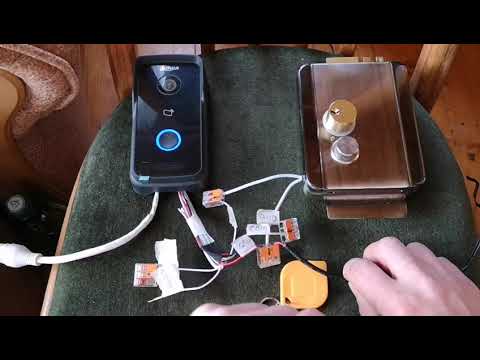 Видео: Звонок Dahua DH-VTO2111D-W, + панель Dahua DH-VTH1550CH + электромеханический замок. Схема подключ.