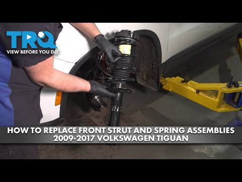 Видео: Как заменить передние стойки и пружины в сборе на Volkswagen Tiguan 2009-2017