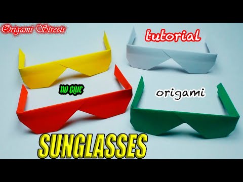 Видео: Как сделать оригами очки из бумаги. Оригами очки. Очки из бумаги.
