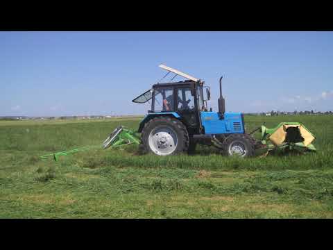 Видео: Косилка дисковая Samacz на передней навеске МТЗ 82 (4 метра за 1 проход)