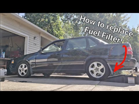 Видео: Как заменить топливный фильтр Volvo S70