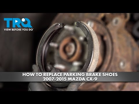 Видео: Как заменить колодки стояночного тормоза на Mazda CX-9 2007-2015 годов