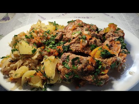 Видео: По Домашнему - Ребрышки с капустой и картофелем. Пальчики оближешь.