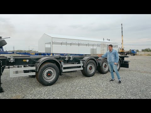 Видео: Полуприцеп Контейнеровоз GRUNWALD с передней разнесенной осью под все виды контейнеров Эксклюзив