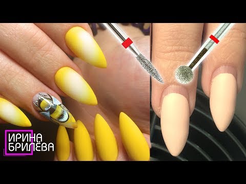 Видео: Аппаратный маникюр 🐝 Симметричный опил ногтей 🐝 Применение фрез Пламя и Шар