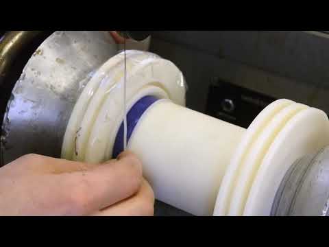 Видео: Изготовление высоковольтного трансформатора. Работа на намоточном трансформатопы станке