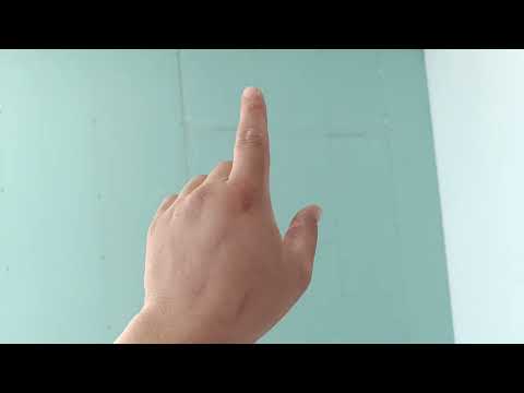 Видео: Как правелино фиксировать гипсокартон на стену