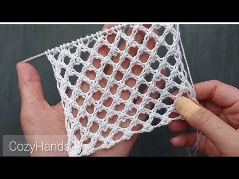 Видео: Крупная сетка спицами для вязания туник, джемперов
