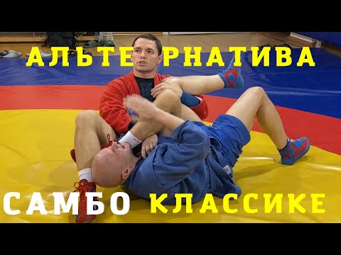 Видео: Техника САМБО. УЩЕМЛЕНИЕ БИЦЕПСА (BICEPS SLICER) через руку, соперник НА СПИНЕ_Школа самбо Sambi.st