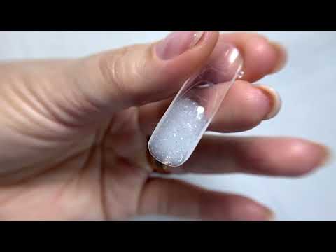 Видео: Нарощування нігтів на верхні форми, техніка постановки форми на готовність