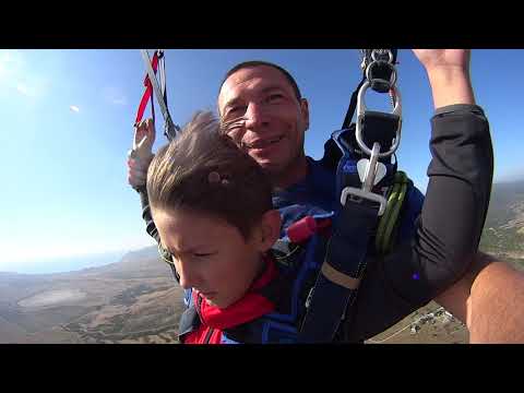 Видео: Прыжок Тандем ребёнок 10 лет.