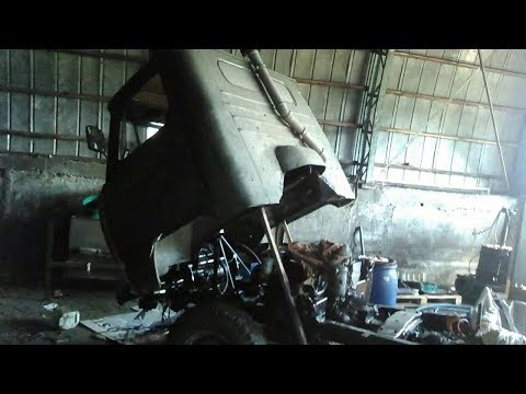 Видео: Поднимаем кабину в УАЗ 3303.