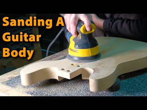 Видео: Сборка точной бас-гитары. Часть 12. Шлифовка и подготовка корпуса гитары к покраске