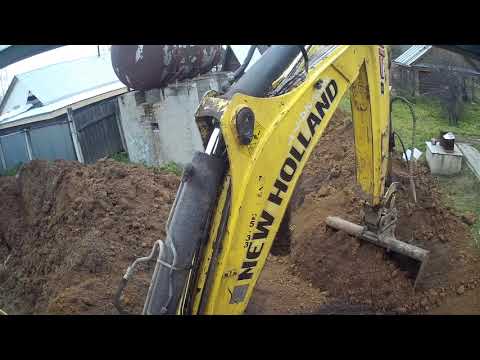 Видео: В ДЕРЕВНЕ.ЭКСКАВАТОР ПОГРУЗЧИК NEW HOLLAND B115B