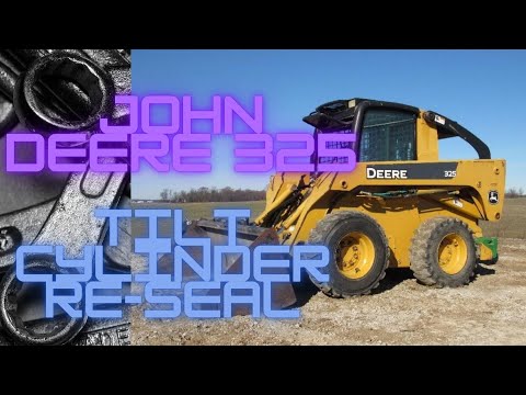Видео: Повторное уплотнение цилиндра наклона мини-погрузчика John Deere 325