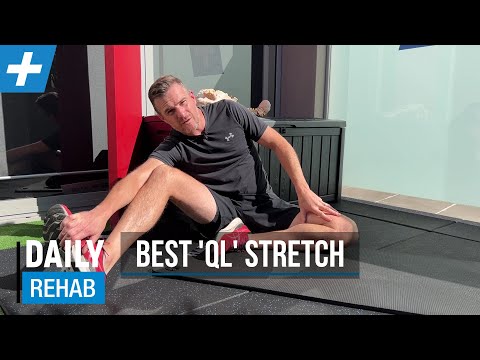 Видео: Лучшая растяжка для квадратной мышцы поясницы (QL) | Тим Кили | Physio REHAB