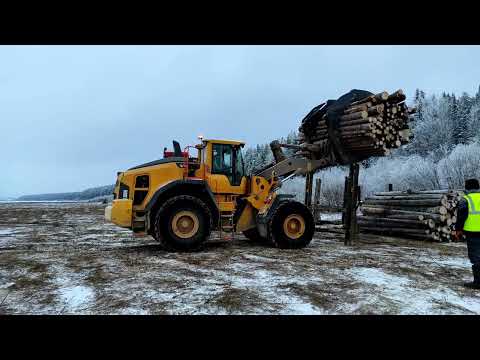 Видео: Работа фронтального погрузчика Вольво L180H.