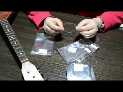 Видео: Ставим гитарные струны на балалайку