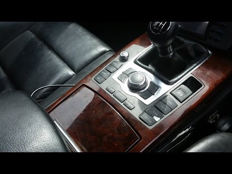Видео: Как заменить центральную консоль - управление MMI, кнопку ручного тормоза на Audi A6 (C6 4F)