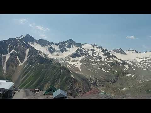 Видео: Азау - Кругозор - Мир ( с заходом на ледник малый Азау)