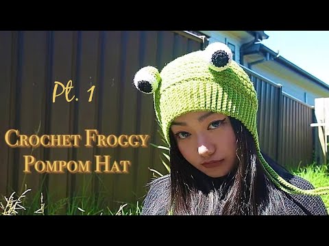 Видео: Вязаная крючком шапка-лягушка с помпоном, часть 1 (для продвинутых новичков)