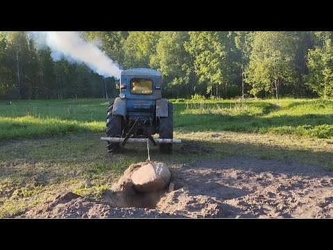 Видео: ДОСТАЮ ОГРОМНЫЙ КАМЕНЬ ТРАКТОРОМ Т 40 ! ! !