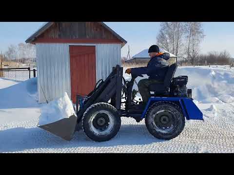 Видео: чистка  снега мини погрузчиком.первый выезд