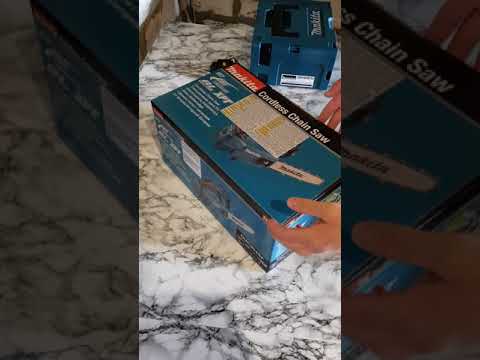 Видео: Цепная пила Makita DUC204