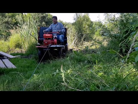Видео: Лебёдка для мотоблока (самовытаскиватель)