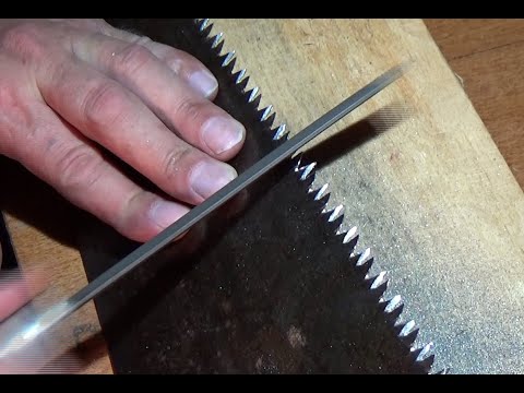 Видео: Как точить ножовку ромбовидным напильником. How to sharpen a saw