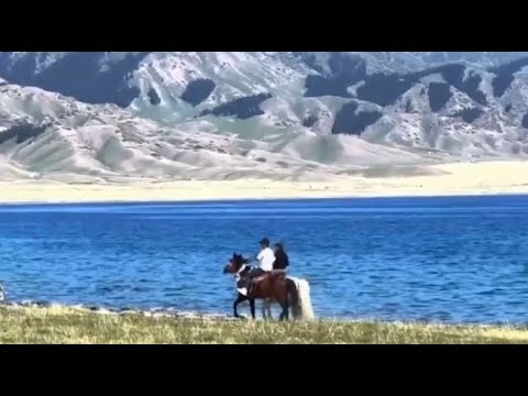 Видео: Қытайдан атпен шыққан ерлі-зайыптылар Алматы іргесіне жетті