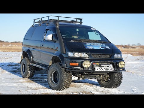 Видео: пробую установить резину 35 размера м т грязь mitsubishi delica