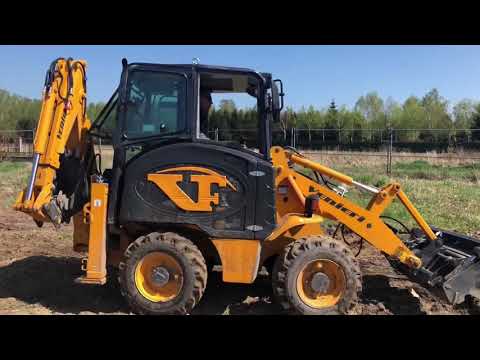 Видео: Мини экскаватор-погрузчик Venieri VF 1.33B. Перемещение и планирование грунта.
