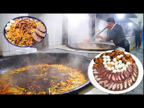 Видео: ГИГАНТСКИЙ ПЛОВ в КАЗАНЕ 600 кг каждый день l Популярная уличная еда в Узбекистане l КАМОЛОН ПЛОВ