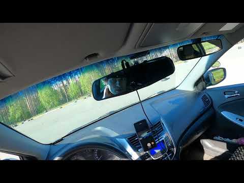 Видео: Парковка задом по линиям разметки на пустой парковке