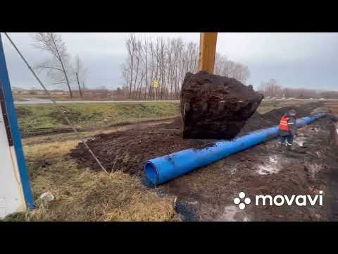 Видео: Работа на экскаваторе, на траншее.