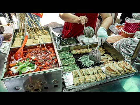 Видео: Бусан продовольственные столы, Pajeon & tteokbokki & sundae, Уличная еда в Кореи