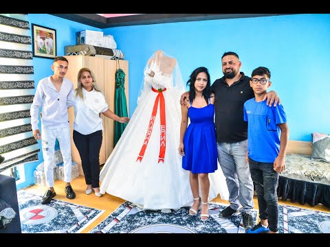 Видео: Носене на роклята на Илияна и Емил гр.Разлог Grand studio