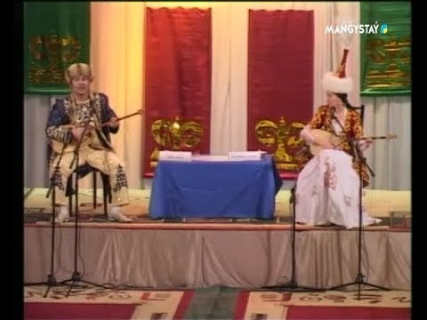 Видео: Нұрлан Мұсаев - Қарлығаш Әубәкірова  Айтыс, Ақтау 2006ж