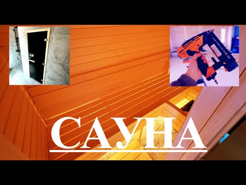Видео: Сауна в каркасном доме. Обшиваем стены и потолок, монтируем полок. Дверь в сауну. Душевая дверь