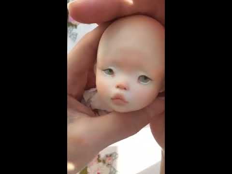Видео: Роспись лица куклы