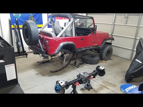 Видео: 8.8 Замена оси на Jeep Wrangler YJ