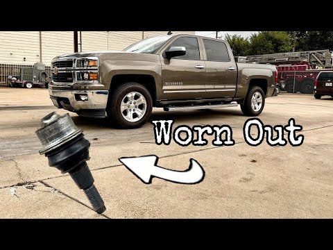 Видео: Как заменить нижние шаровые опоры на Chevrolet Silverado (4x4) 2014 года выпуска