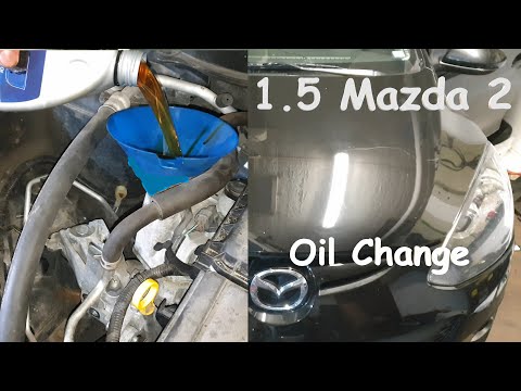 Видео: Замена масла / фильтра Mazda 2 1.5