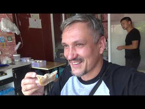 Видео: Хайнань, Санья, район Дадунхай. Магазины, кафе, рестораны