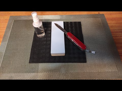 Видео: Заточка ножа victorinox на камне suehiro skg-27