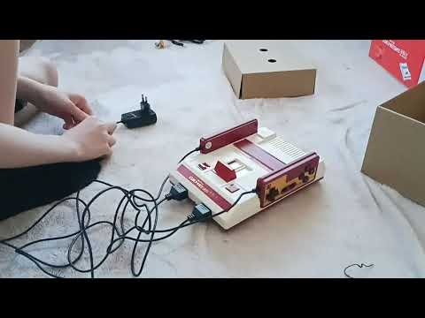 Видео: Распаковка и подключение игровой консоли retro Genesis 8 bit