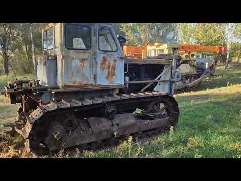 Видео: Покупка трактора Т100(С100)  Buying a T100 tractor