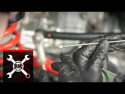 Видео: Как заменить масло в Honda Talon 1000R/X