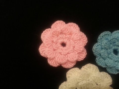 Видео: Как связать цветок крючком